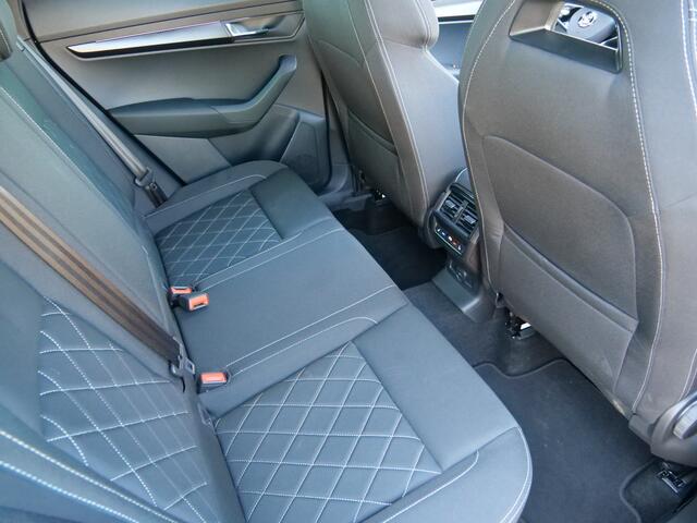 Skoda Karoq 1.5 TSI ACT Sportline Business 150 Pk Automaat Navi / DAB / Pano-dak / Camera / Winterpakket