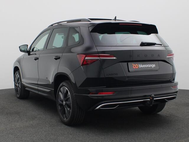 Skoda Karoq 1.5 TSI ACT Sportline Business 150PK DSG Panoramadak, Trekhaak, Achteruitrijcamera, Winterpakket Plus, Keyless, Virtual pedal, 18'' lichtmetaal, Side Assist