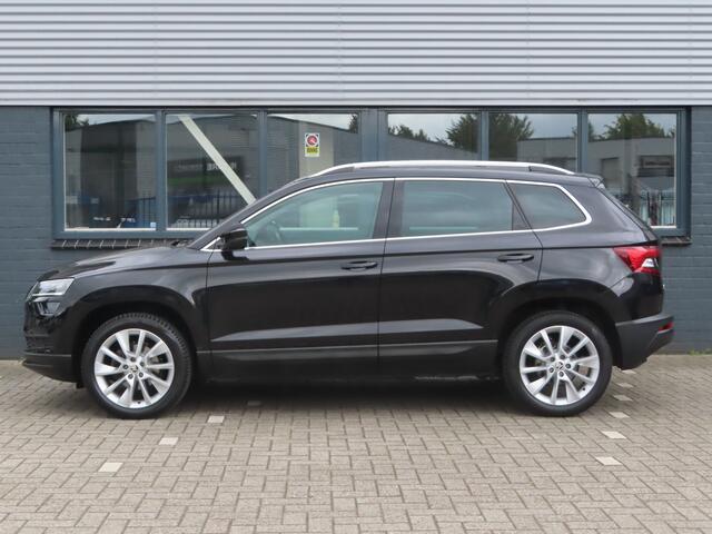 Skoda Karoq 1.5 TSI ACT Style DSG | sportstoelen | groot nav | voorruitverwarming | stoelverwarming | elektrische stoel + geheugen | camera | adaptive cruise