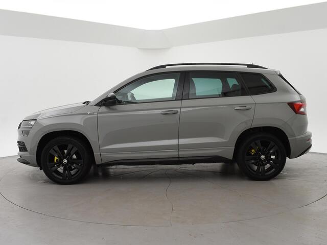 Skoda Karoq 1.5 TSI ACT SPORTLINE + WEGKL. TREKHAAK | VOL LEDER | ADAPTIVE CRUISE | CANTON | CAMERA