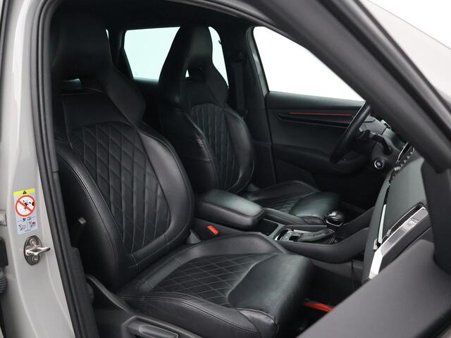 Skoda Karoq 1.5 TSI ACT SPORTLINE + WEGKL. TREKHAAK | VOL LEDER | ADAPTIVE CRUISE | CANTON | CAMERA