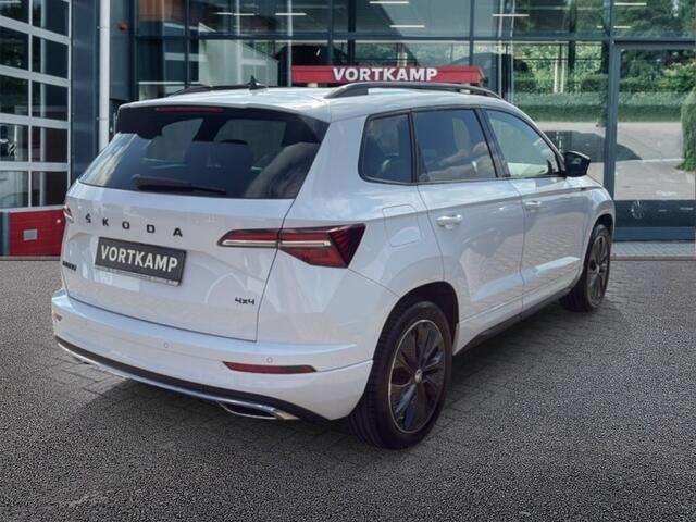 Skoda Karoq 2.0 TDI DSG 4X4 SPORTLINE TREKHAAK/PANO-DAK/CAM/ELEK-KLEP/CRUISE/STOELVERW