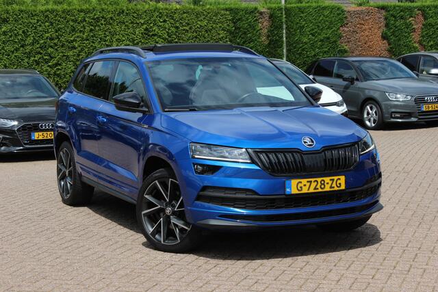 Skoda Karoq 2.0 TSI 4x4 Sportline Business / NL Auto! / Trekhaak / Panoramadak / Camera / CarPlay / Keyless / 19'' / DAB / Cruise Control
