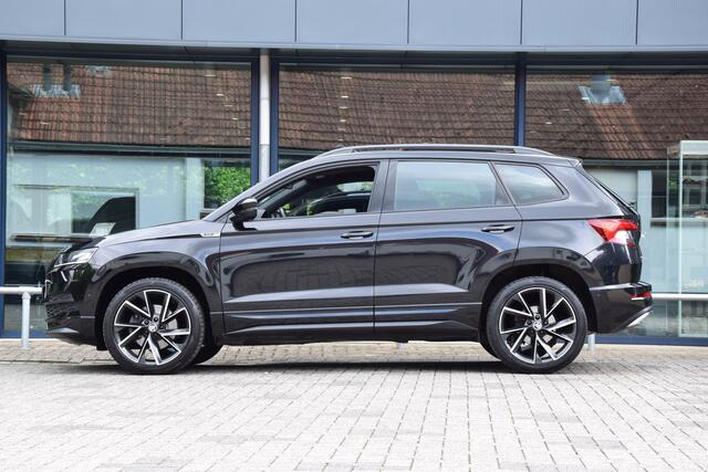 Skoda Karoq 2.0 TSI 4x4 Sportline Business DSG Automaat | BOVAG Garantie | Unieke Auto! | Trekhaak | Panoramadak | Camera | Adaptive Cruise Control | 19'' Velgen | Stoelverwarming | Canton |