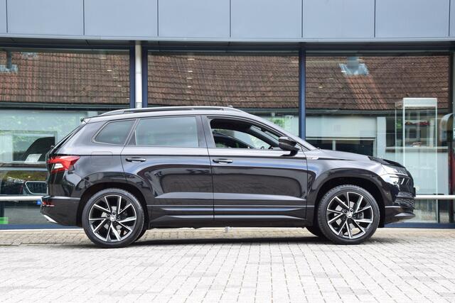Skoda Karoq 2.0 TSI 4x4 Sportline Business DSG Automaat | BOVAG Garantie | Unieke Auto! | Trekhaak | Panoramadak | Camera | Adaptive Cruise Control | 19'' Velgen | Stoelverwarming | Canton |