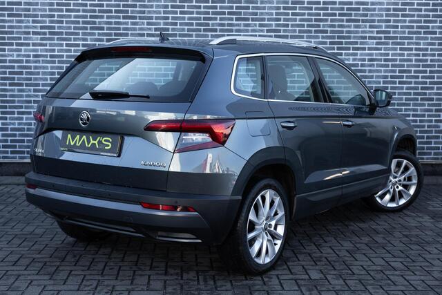Skoda Karoq 1.5 TSI DSG Style Business | Trekhaak | Panoramadak | Achteruitrijcamera | Parkeersensoren | Keyless Entry | Elektrische Achterklep | Canton Audio | LED Koplampen | Stoelverwarming | Navigatie | Apple Carplay | Android Auto
