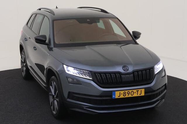 Skoda Kodiaq 1.5 TSI Sportline Business 7p. / AUTOMAAT/ TREKHAAK/ CAMERA/ PARK. SENSOREN/ ADAPT. CUIRSE/ STOELVERWARM./ LED/ VIRTUAL COCKPIT/ GETINT GLAS/ 20" LMV
