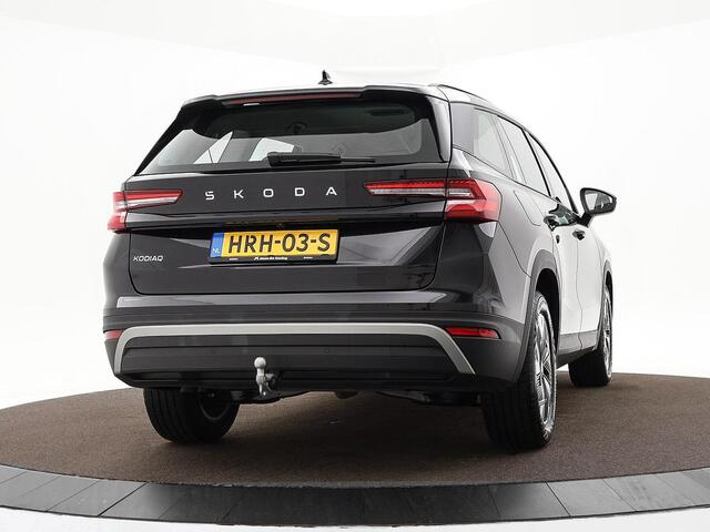Skoda Kodiaq 1.5 TSI 150pk DSG MHEV Business Edition 7p. · Camera · Inklap. Trekhaak · Elek. Bestuurdersstoel + Geheugen · Side Assist · Stoelverwarming · ACC · Garantie t/m 03-06-2029 of 100.000km
