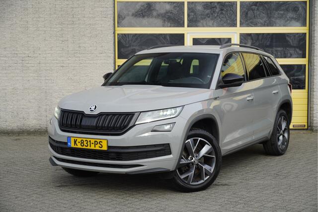 Skoda Kodiaq 1.5 TSI 150PK! Automaat Sportline Business BJ2021 Lmv 19" | Led V+A | Pdc | Keyless entry | Elek. trekhaak | Achteruitrijcamera | App-Connect | Navi | Virtual cockpit | Dashboard verlichting | Elek. Be stoel+Mem | Verwarmde voorstoelen | Zwarte hemel