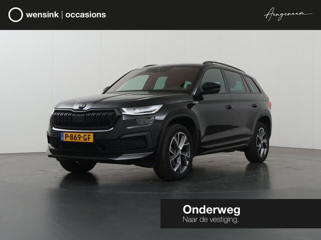 Skoda Kodiaq 1.5 TSI Sportline Business 7p. | Sportstoelen | Lederen Interieur | Navigatie | Ele.verstelbare stoelen + geheugen | Live Cockpit | DAB | Apple CarPlay/Android Auto | Camera | Stoel/Stuurverwarming | Adaptieve Cruise Control | Trekhaak Wegklapbaar |