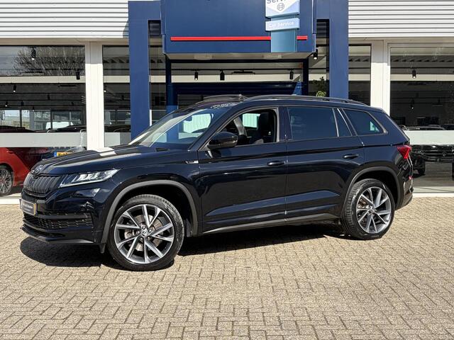 Skoda Kodiaq 2.0 TSI 4x4 Sportline Business / Automaat / 1e-Eigenaar / Open-Panodak / Alcantara / Canton Premium-Audio / Adaptieve Control-Control / Stoelverwarming / Elektr.-Stoelen met Geheugen / Apple-Carplay & Android-Auto / Elektr.-Wegklapbare Trekhaak / Dodehoek