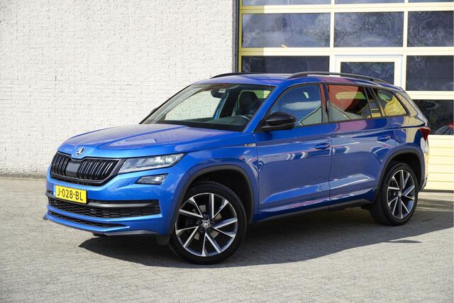 Skoda Kodiaq 1.5 TSI 150PK! Automaat Sportline Business BJ2020 Lmv 20" | Led V+A | Pdc | Keyless entry | Trekhaak afneembaar | Elek. achterklep | Achteruitrijcamera | App-Connect | Navi | Virtual cockpit | Dashboard verlichting | Sportstoelen/Sportstuur | Zwarte hemel