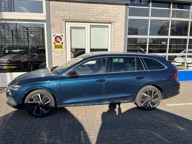 Skoda OCTAVIA Combi 1.4 TSI iV PHEV Style / AUTOMAAT/ 18" LMV/ ADAPT. CRUISE/ SMARTLINK/ NAVI/ PARK. SENSOREN + CAMERA/ DAB/ STOEL-STUUR VERWARM/