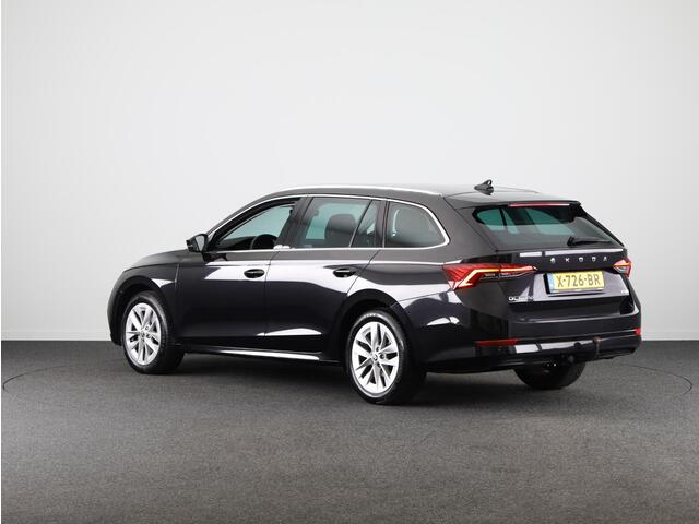 Skoda OCTAVIA Combi 1.0 e-TSI Business Edition Plus 110 pk Automaat (DSG) | Verlengde garantie | Navigatie | Trekhaak | Parkeersensoren | Adaptieve cruise control | Stoelverwarming |