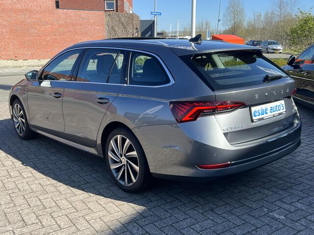 Skoda OCTAVIA Combi 1.5 TSI 150 pk Automaat Business Edition Plus Navigatie Trekhaak Panoramadak Camera 18 Inch Velgen ACC DAB Stoel + Stuurverwarming