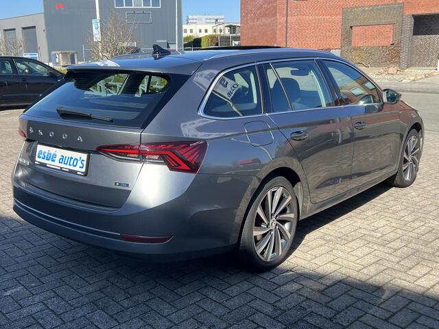 Skoda OCTAVIA Combi 1.5 TSI 150 pk Automaat Business Edition Plus Navigatie Trekhaak Panoramadak Camera 18 Inch Velgen ACC DAB Stoel + Stuurverwarming