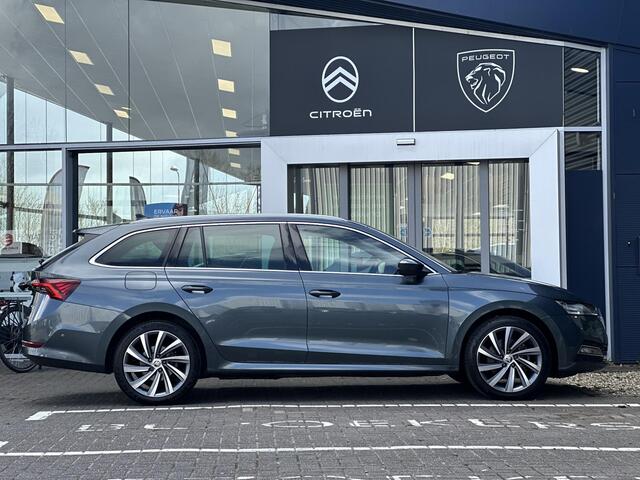 Skoda OCTAVIA Combi 1.4 TSI iV PHEV Business Edition Plus | Adaptive Cruise Control | Stoel-/Stuurverwarming | Elektrische Stoelen met geheugen | Climate Control | Parkeercamera/-sensoren | Apple Carplay/Android Auto | Elektrische kofferbak | Keyless Entry/Start | Full