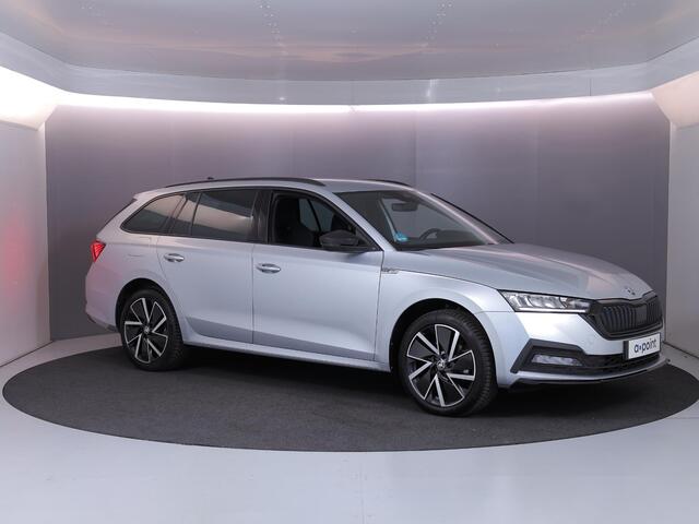 Skoda OCTAVIA Combi 1.4 TSI iV PHEV Sportline Business 204 pk Automaat (DSG) | SOH 96% | Verlengde garantie | Navigatie | Parkeersensoren | Adaptieve cruise control | Stoelverwarming |