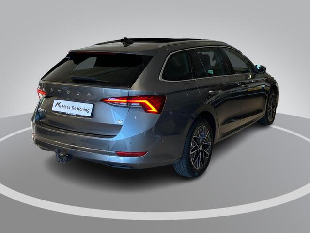 Skoda OCTAVIA Combi 1.4TSI iV 150kW/204PK PHEV Business Edition Plus · Panoramadak · Trekhaak · Navigatie · Camera · Apple/Android Car Play ·