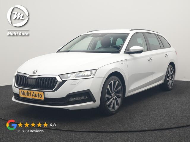 Skoda OCTAVIA Combi 1.4 TSI iV Business Edition PHEV 204pk Dealer O.H | Trekhaak Af Fabriek | Adaptive Cruise | Camera | Stoelmassage | Sportstoelen & Stuur Verwarmd | Keyless | Sfeerverlichting | Crystal LED | Apple Carplay | Navigatie | 18"L.M | Plug In Hybrid