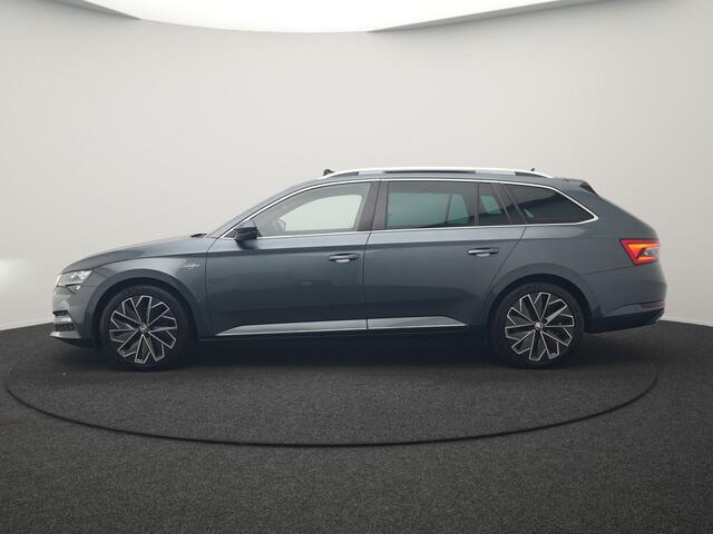 Skoda SUPERB Combi 1.4 TSI iV Laurin & Klement PHEV 218pk Dealer O.H. | Trekhaak Af Fabriek | Panodak | Adaptive Cruise | 360 Camera | Canton Audio | Lederen Comfortzetels Massage & Ventilatie & Memory | Sfeerverlichting | Keyless | Blis | Stuur Verwarmd | Plug In Hyb