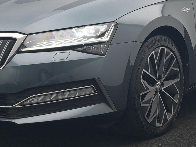 Skoda SUPERB Combi 1.4 TSI iV Laurin & Klement PHEV 218pk Dealer O.H. | Trekhaak Af Fabriek | Panodak | Adaptive Cruise | 360 Camera | Canton Audio | Lederen Comfortzetels Massage & Ventilatie & Memory | Sfeerverlichting | Keyless | Blis | Stuur Verwarmd | Plug In Hyb