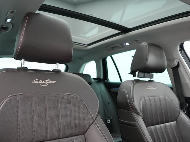 Skoda SUPERB Combi 1.4 TSI iV Laurin & Klement PHEV 218pk Dealer O.H. | Trekhaak Af Fabriek | Panodak | Adaptive Cruise | 360 Camera | Lederen Comfortstoelen Memory & Ventilatie | Canton Audio | Crystal LED | Stoelen & Stuur Verwarmd | Apple Carplay | Blis | DAB | Navigatie | 19"L.M | Plug In Hybrid |