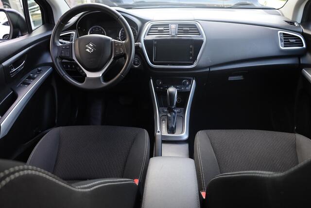 Suzuki S-Cross 1.0 Boosterjet Exclusive TREKHAAK-AFN. CAMERA STOELVERW. NAVI CRUISE PDC CLIMA 17"LMV