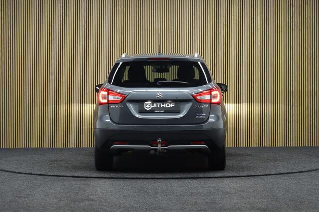 Suzuki S-Cross 1.4 Boosterjet AllGrip Style Smart Hybrid | Elek. Glazen Panoramadak | Adaptive-cruise | Afneembare Trekhaak | Leder | Camera | Clima | Parkeerhulp | Apple Carplay & Android Auto | Navigatie | Keyless | Stoelverwarming