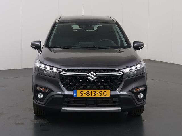 Suzuki S-Cross 1.4 Boosterjet Style Smart Hybrid | Navigatie | Cruise Control Adaptief | 360° Camera | LED | DAB | Climate Control | Stoelverwarming | Rijhulpsysteem | Apple Carplay/Android Auto | Keyless Entry/Go |