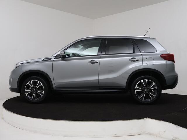 Suzuki VITARA 1.4 Boosterjet Style Smart Hybrid | Apple Carplay / Android Auto (Navigatie) | Camera | LM velgen | Stoelverwarming | Leder |
