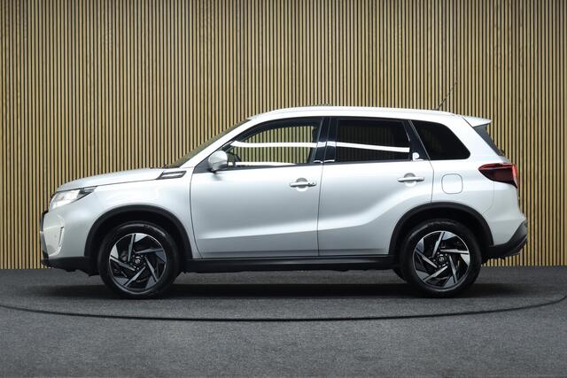 Suzuki VITARA 1.5 Hybrid Automaat Style | Panoramadak | Leder-Alcantara | Camera | Clima | Navigatie | Parkeerhulp | Adaptive-cruise | Apple Carplay & Android Auto | Keyless | Dodehoekdetectie