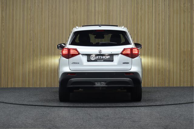 Suzuki VITARA 1.5 Hybrid Automaat Style | Panoramadak | Leder-Alcantara | Camera | Clima | Navigatie | Parkeerhulp | Adaptive-cruise | Apple Carplay & Android Auto | Keyless | Dodehoekdetectie