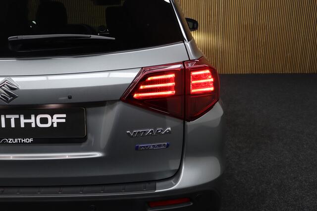 Suzuki VITARA 1.4 Boosterjet Style Smart Hybrid | Adaptive-cruise | Afneembare Trekhaak | Camera | Clima | Navigatie | Parkeersensoren | Stoelverwarming | Keyless | Dodehoekdetectie