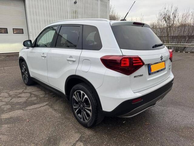 Suzuki VITARA 1.4 BOOSTERJET STYLE SMART HYBRID Open dak | Alcantara | Keyless | Dodehoeksensoren