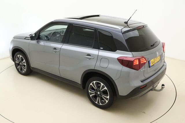 Suzuki VITARA 1.4 Boosterjet Style Smart Hybrid 129pk | Panoramadak | Trekhaak | Climate Control | Cruise Control Adaptief | Camera | Stoelverwarming | Navigatie | Parkeersensoren
