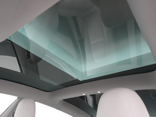 Tesla Model 3 Long Range 75kWh 463PK Trekhaak Ivory-Int. FSD Full Self Driving Computer-3 Premium Audio 4wd Leer AutoPilot Panoramadak Camera's Adaptive-CruiseControl-Stop&Go Pdc-a+v Ecc18" Lmv Dual Motor Stoel en achterbank verwarming Keyless Electr.Stoelen+Memory+Eas