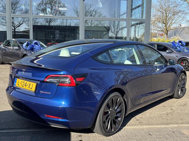Tesla Model 3 Performance AWD 75 kWh VAN ¤34.900,- VOR ¤32.770,- UW LENTEVOORDEEL ¤2.130,- | ORIG. NL. NAP KM. | WIT LEDER