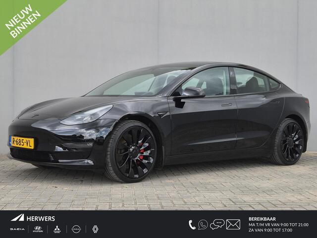 Tesla Model 3 Performance AWD 75 kWh / CCS snelladen / Stuur- Stoel & Achterbank verwarming / Panoramadak / Rondomzicht camera / Draadloze telefoon lader / Elektrische achterklep / Voorruit verwarming / Apple Carplay Android Auto / Lichtmetalen wielen 20" /