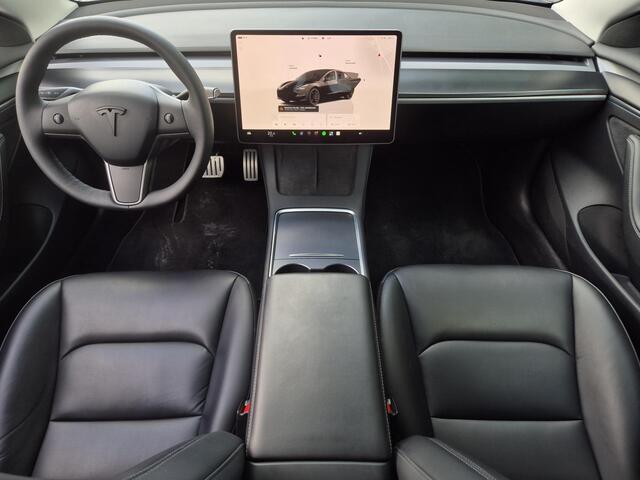 Tesla Model 3 Performance AWD 75 kWh / CCS snelladen / Stuur- Stoel & Achterbank verwarming / Panoramadak / Rondomzicht camera / Draadloze telefoon lader / Elektrische achterklep / Voorruit verwarming / Apple Carplay Android Auto / Lichtmetalen wielen 20" /