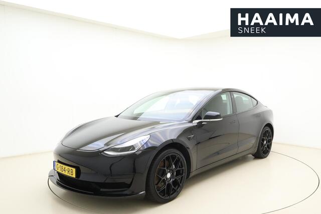 Tesla Model 3 Standard RWD Plus 60 kWh | Trekhaak | Panoramadak | SOH 88,4% | Elektrische best.stoel | Lichtmetalen velgen | Lederenkleding