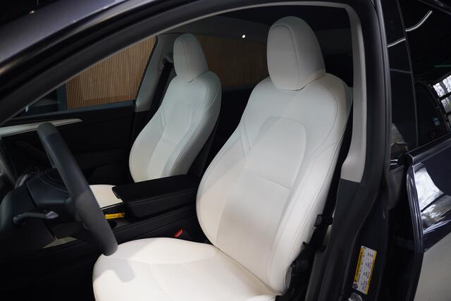 Tesla Model Y Long Range Dual Motor AWD 514pk Afn. trekhaak Navi Camera Leer Warmtepomp ACC Autopilot PDC Elektr. achterklep Stoelverwarmimg voor en achter Stuurverwarming Optie: Full Self-Driving Capability BTW auto