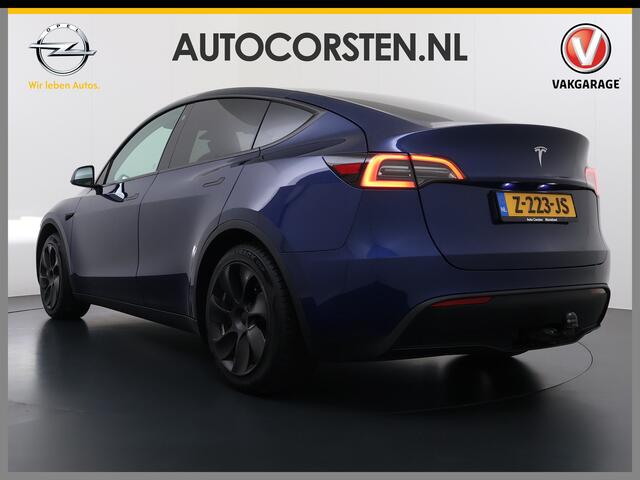 Tesla Model Y RWD 300pk Trekhaak SOH 92% Warmtepomp LFP-Accu Leer Lmv Camera's Panoramadak Adap.Cruise Navi Ecc Autopilot Stoel+Stuur+Achterbank Verwarming Elek.Achterklep Dodehoek detector Draadloze telefoonlader 1e Eigenaar 1.600KG Trekgewicht Fabrieksgarantie op Mot