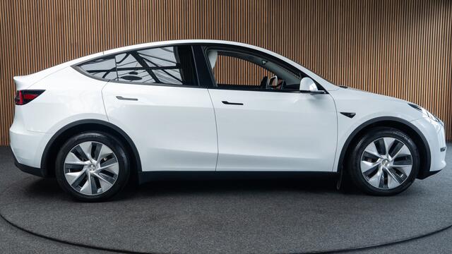 Tesla Model Y Long Range AWD 75 kWh Full Self driving 3 - warmtepomp - Cruise Controll Adaptief - 360 Camera - Wit leder