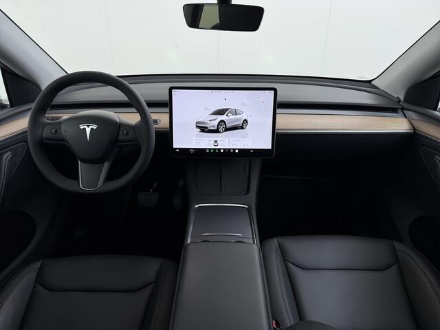Tesla Model Y Long Range AWD 75kWh SOH 94% Warmtepomp AI-Computer Traffic Aware Adap.Cruise Leder Panoramadak Navi Ecc Camera Stoel+Stuurverwarming Privacy Glas Lmv Elek.Achterklep Led Elek.Stoelen+Memory 4WD Fabrieksgarantie tot 15-02-2027 - Garantie op de Accu+Motor