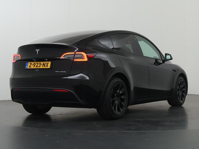 Tesla Model Y Long Range AWD 75 kWh | SOH 94% | Full Self Driving Capability* | Stoelverwarming voor + achter | Adaptieve Cruise Control | Camera | Panoramadak | Ele. stoelen + geheugen | Ele. kofferdeksel | NL Auto |