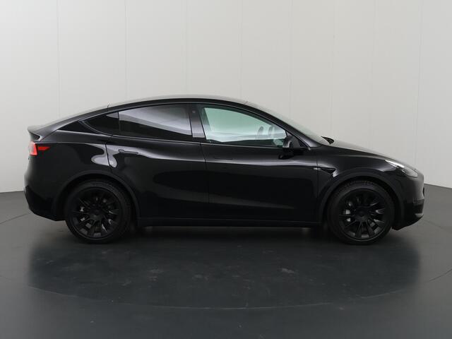 Tesla Model Y Long Range AWD 75 kWh | SOH 94% | Full Self Driving Capability* | Stoelverwarming voor + achter | Adaptieve Cruise Control | Camera | Panoramadak | Ele. stoelen + geheugen | Ele. kofferdeksel | NL Auto |
