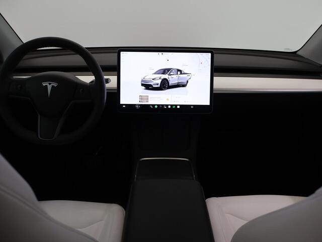 Tesla Model Y Long Range AWD 75 kWh | SOH 94% | Full Self Driving Capability* | Stoelverwarming voor + achter | Adaptieve Cruise Control | Camera | Panoramadak | Ele. stoelen + geheugen | Ele. kofferdeksel | NL Auto |
