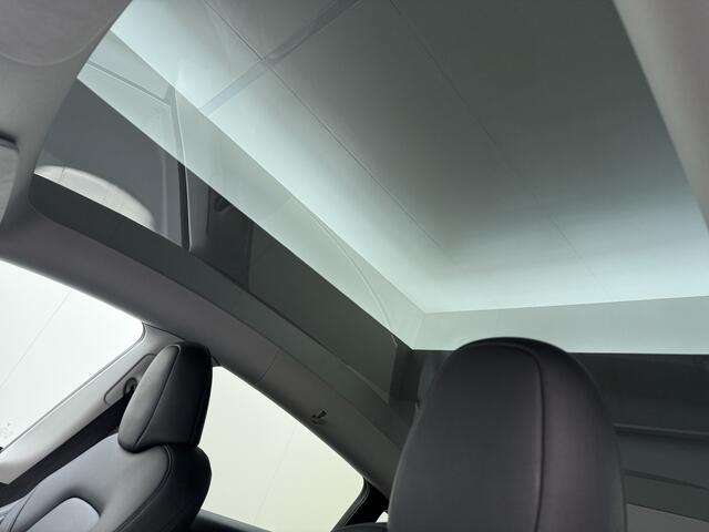 Tesla Model Y Long Range AWD 75kWh Warmtepomp Stoel+Stuur+Achterbankverwarming Premium Audio Leder Adap.Cruise Navi Camera's Ecc Keyless Voorverwarmen+Koelen Elek.Stoelen+Memory Panoramadak Elek.Achterklep AMD Ryzen(TM) Google Maps Dog+Kampeer modus Lmv 19" Led Privacy
