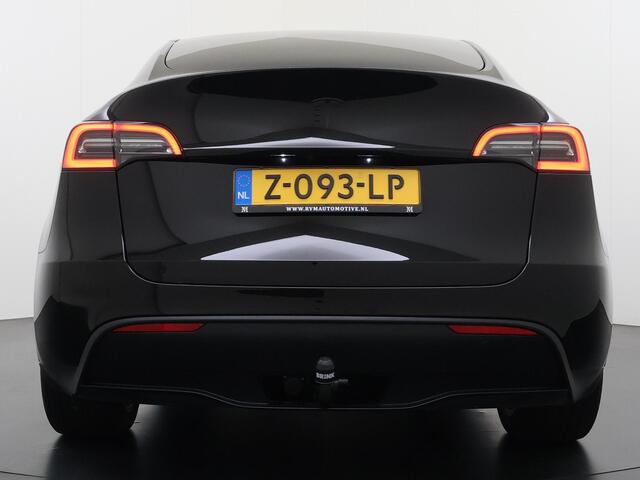 Tesla Model Y RWD 58 kWh AFNEEMBARE TREKHAAK | FABRIEKSGARANTIE OP ACCU & AANDRIJFLIJN TOT 03-2031 OF 160.000 KM | CARBON LIJSTEN |